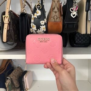 Pink Guess zip around wallet